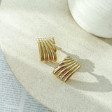 Rina Zlatne Naušnice Sa Teksturiranim Metalom I Čepom Za Zatvaranje Dužine 3,5 cm I Širine 2,5 cm