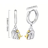 Olivia i Ivy Naušnice U Zagrljaju Psa Elegantan Dizajn Lagane Na Ušima U Blagim Pastelnim Tonovima